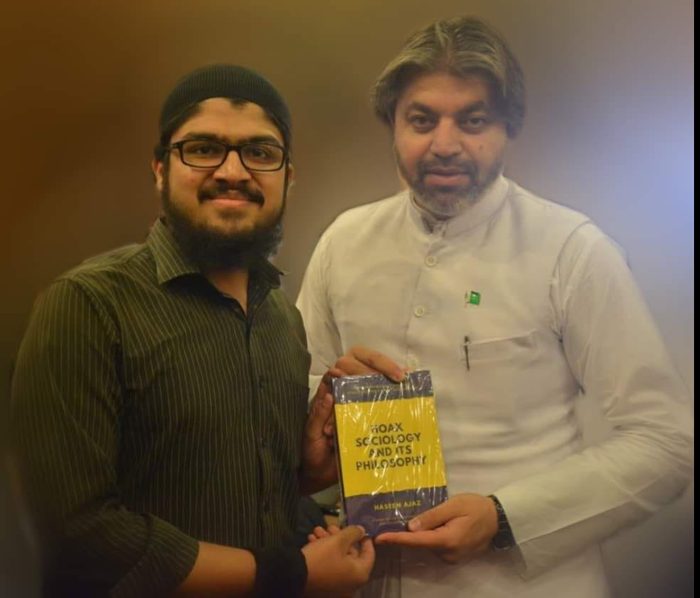 Presenting the book to Ali Muhammad Khan