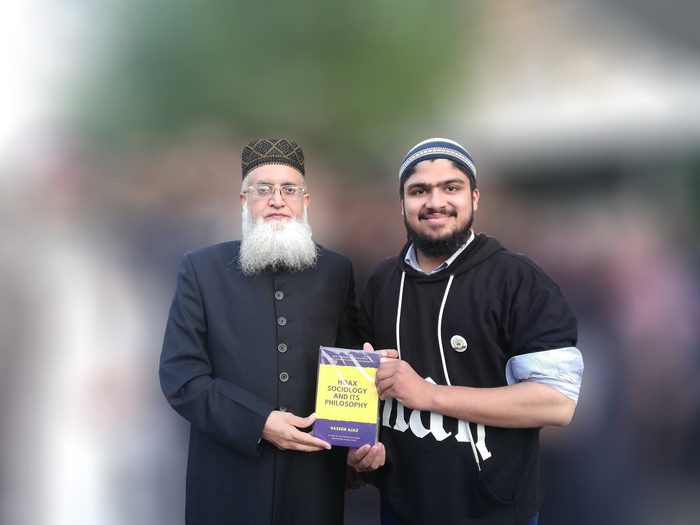 Presenting the book to Mufti Abdul Khaliq Azad Raipuri