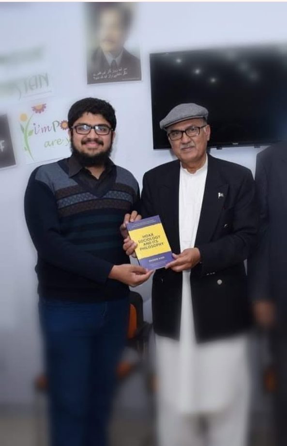 Presenting the book to Lieutenant General Naeem Khalid Lodhi