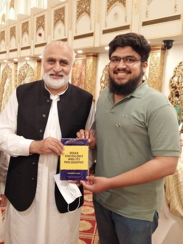 Presenting the book to Niaz Ahmad Akhtar