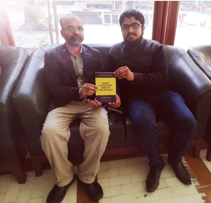 Presenting the book to Salman Asif Siddiqui