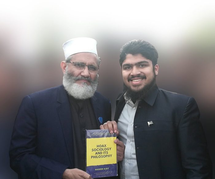 Presenting the book to Siraj ul Haq
